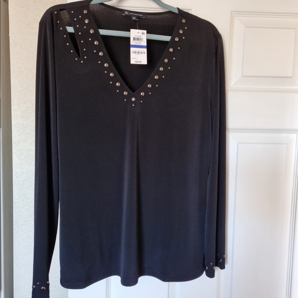 INC cutout long sleeve top. Black stretch fabric. Size XL. New.